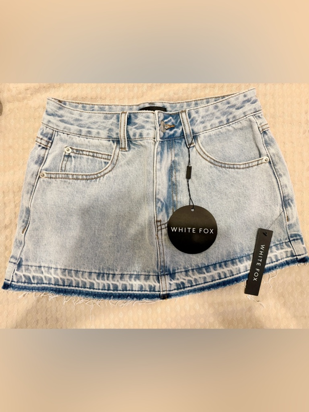 White Fox Boutique Light Wash Denim Mini Skirt